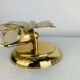 Pair of Hollywood Regency wall lights with glass and gold metal pendants Mathias