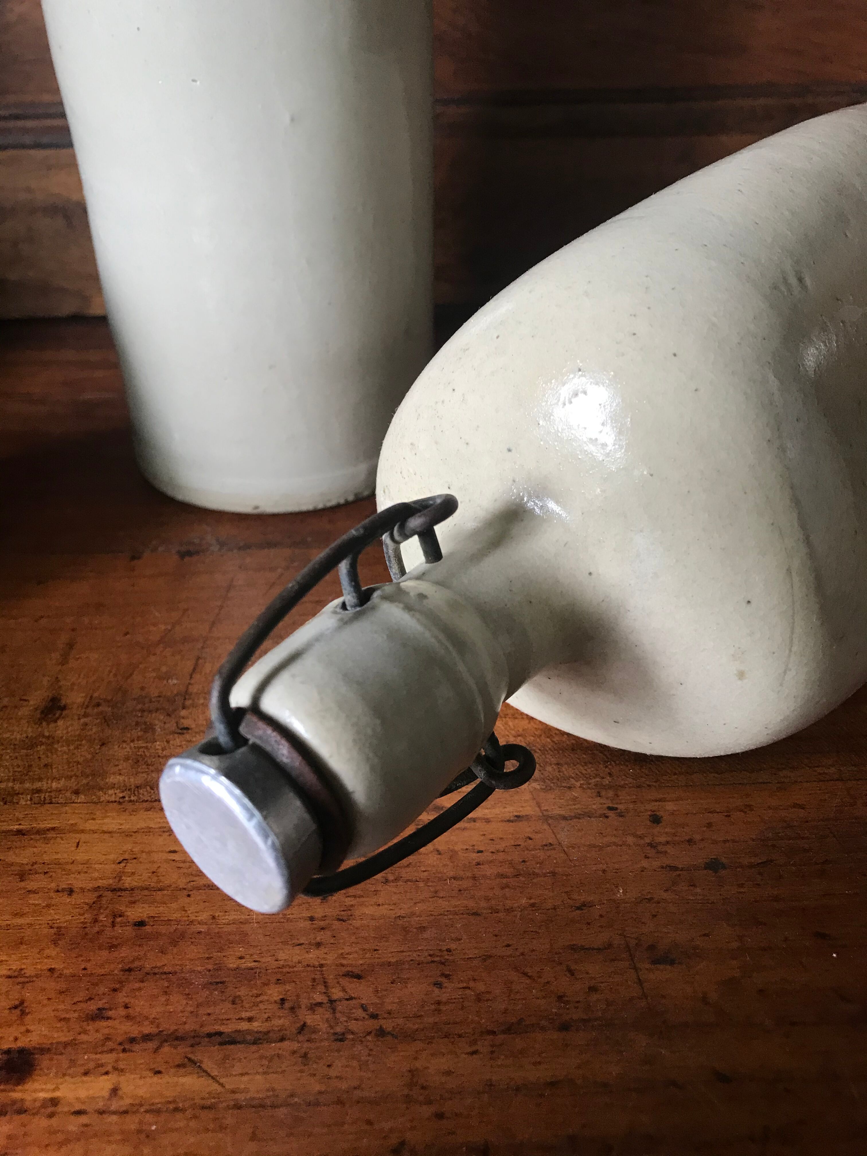 Bottles in varnished sandstone