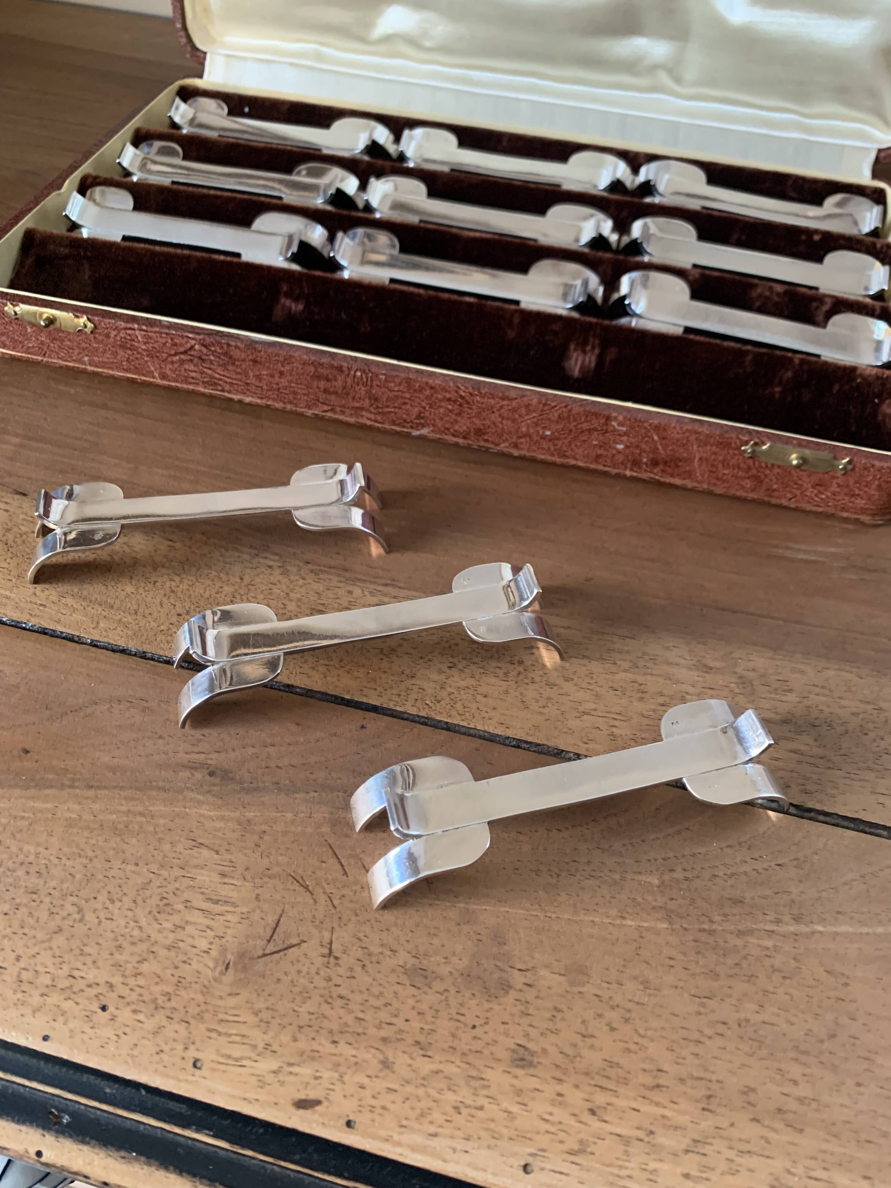 Box of 12 Orbrille silver-plated knife rests