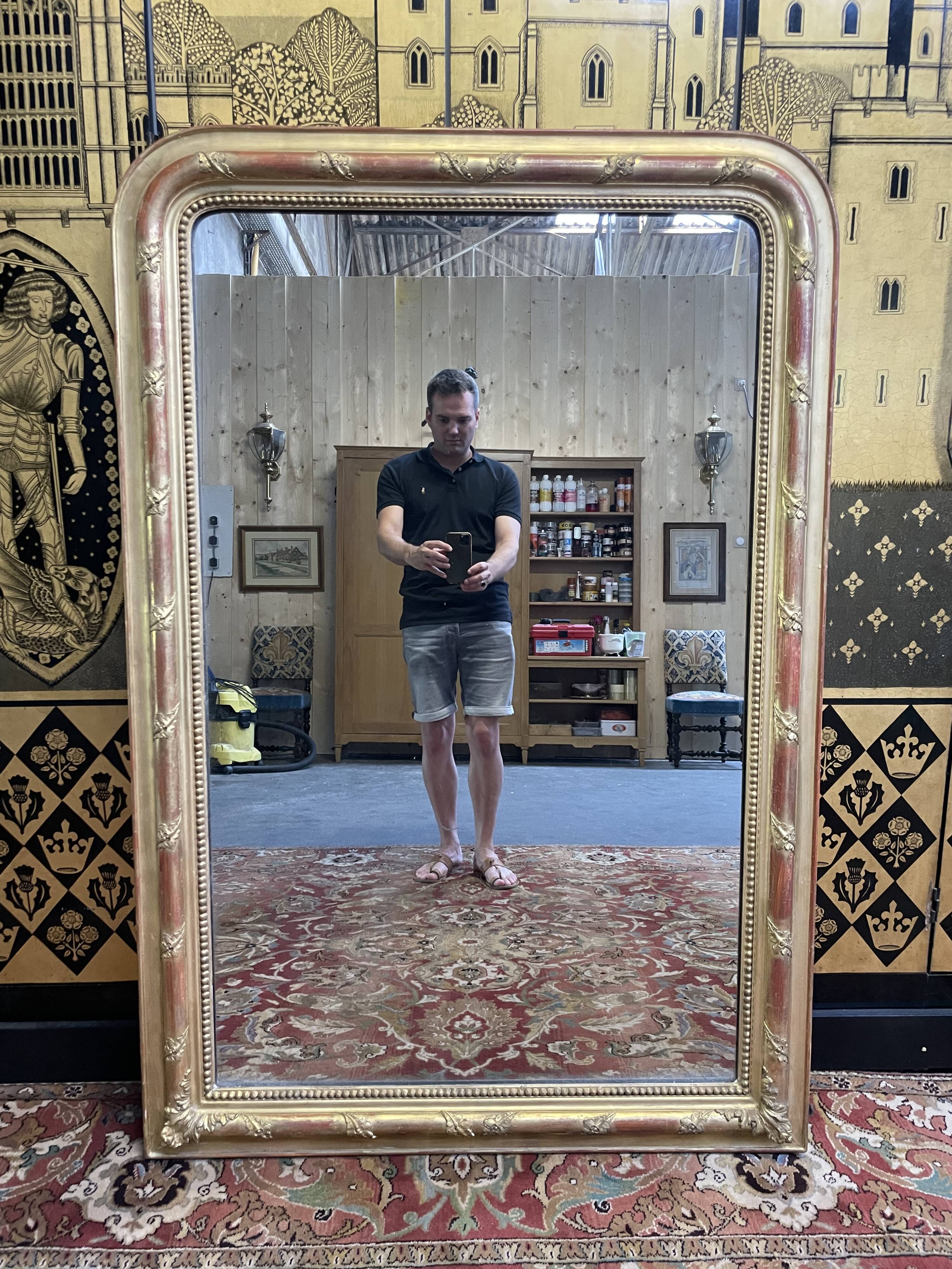 Louis Philippe period mirror in gilded stucco 100x147cm