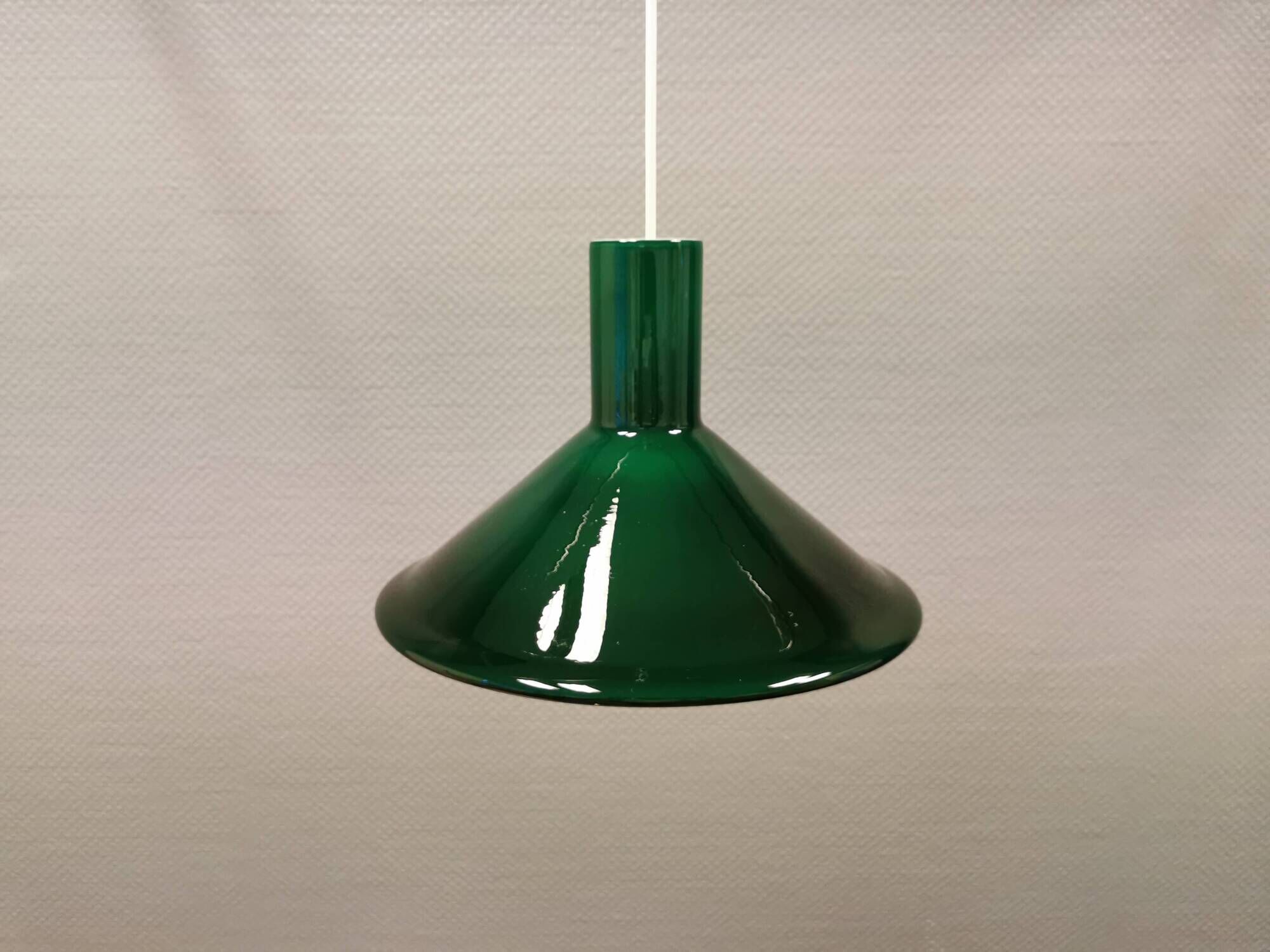 Green glass hanging lamp in double layer glass. Designed by Michael Bang for Holmegaard Denmark 1972