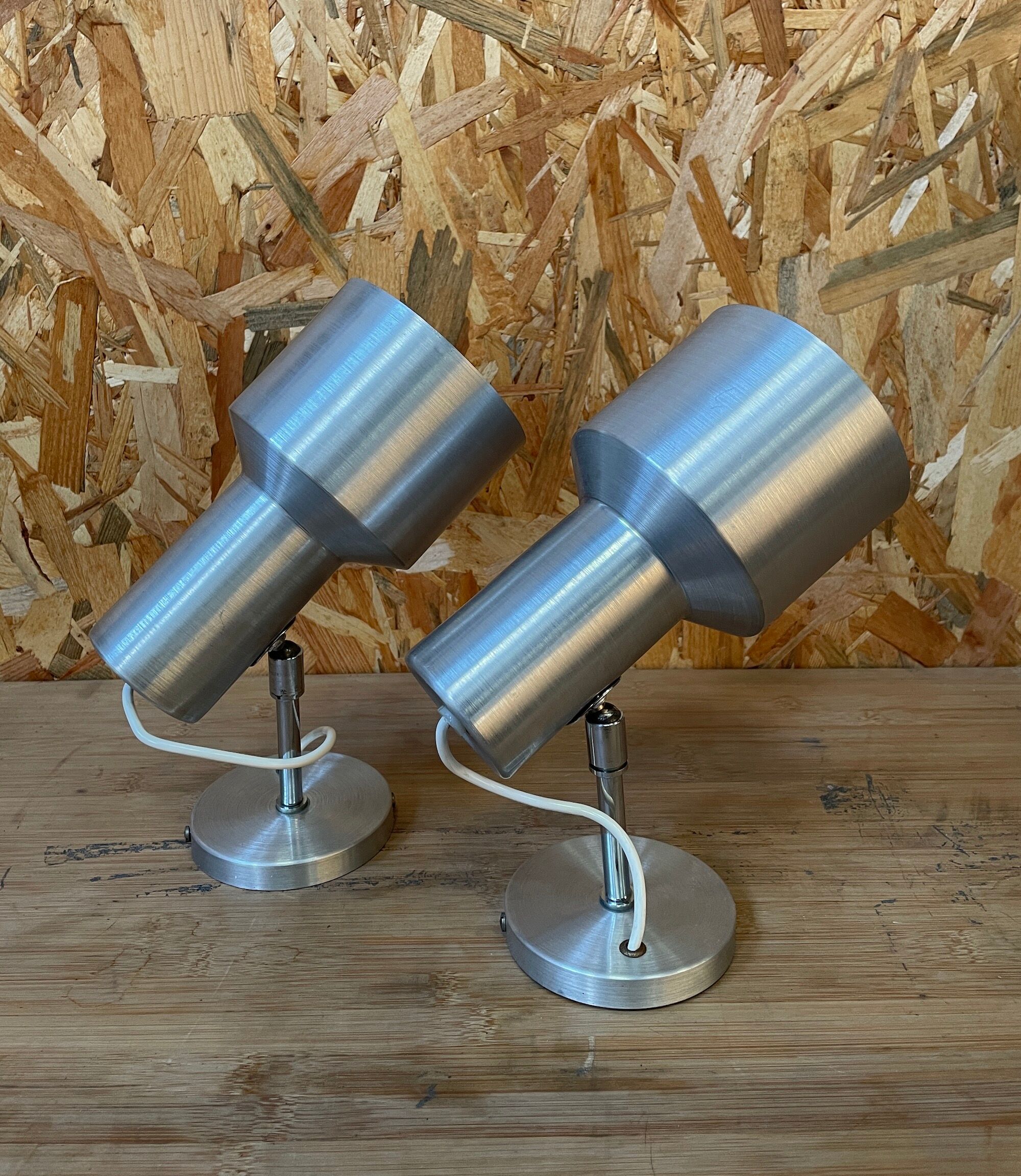 Pair of swivel brushed metal sconces