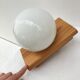 Modernist wall lamp in pine and opaline