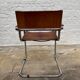 Vintage aluminum tube and tan leather armchair