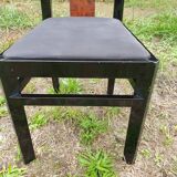 Octagonal table paul michel and its black lacquered chairs and elm magnifying glass