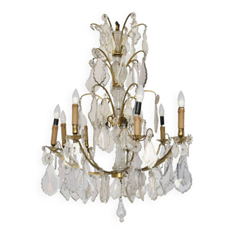 Important gilded bronze chandelier with pendants in the Louis XV style.