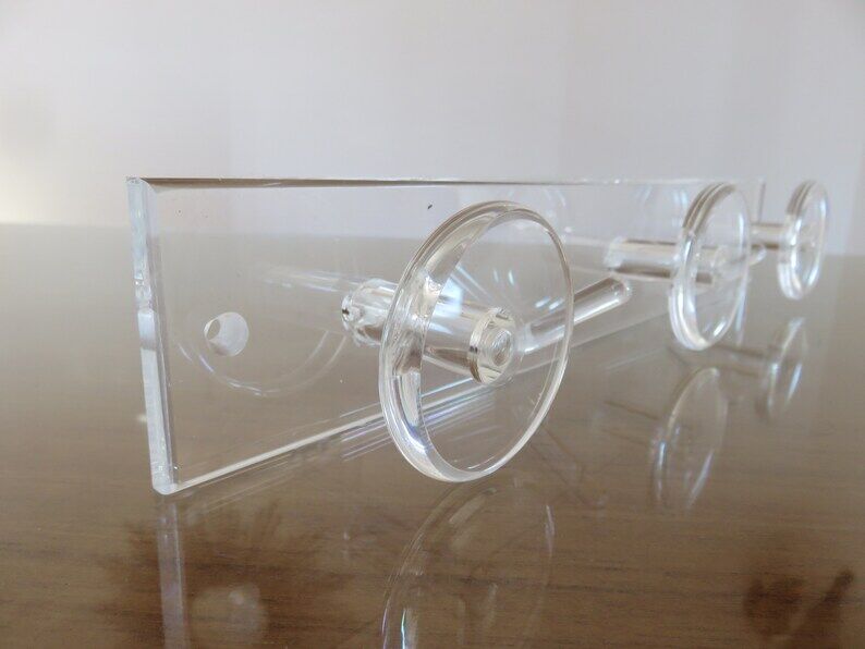 Wall coat rack in transparent plexiglass 3 hooks. 1980