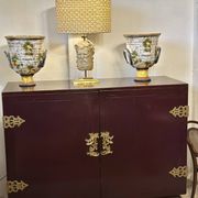 1950's lacquered wood and brass sideboard