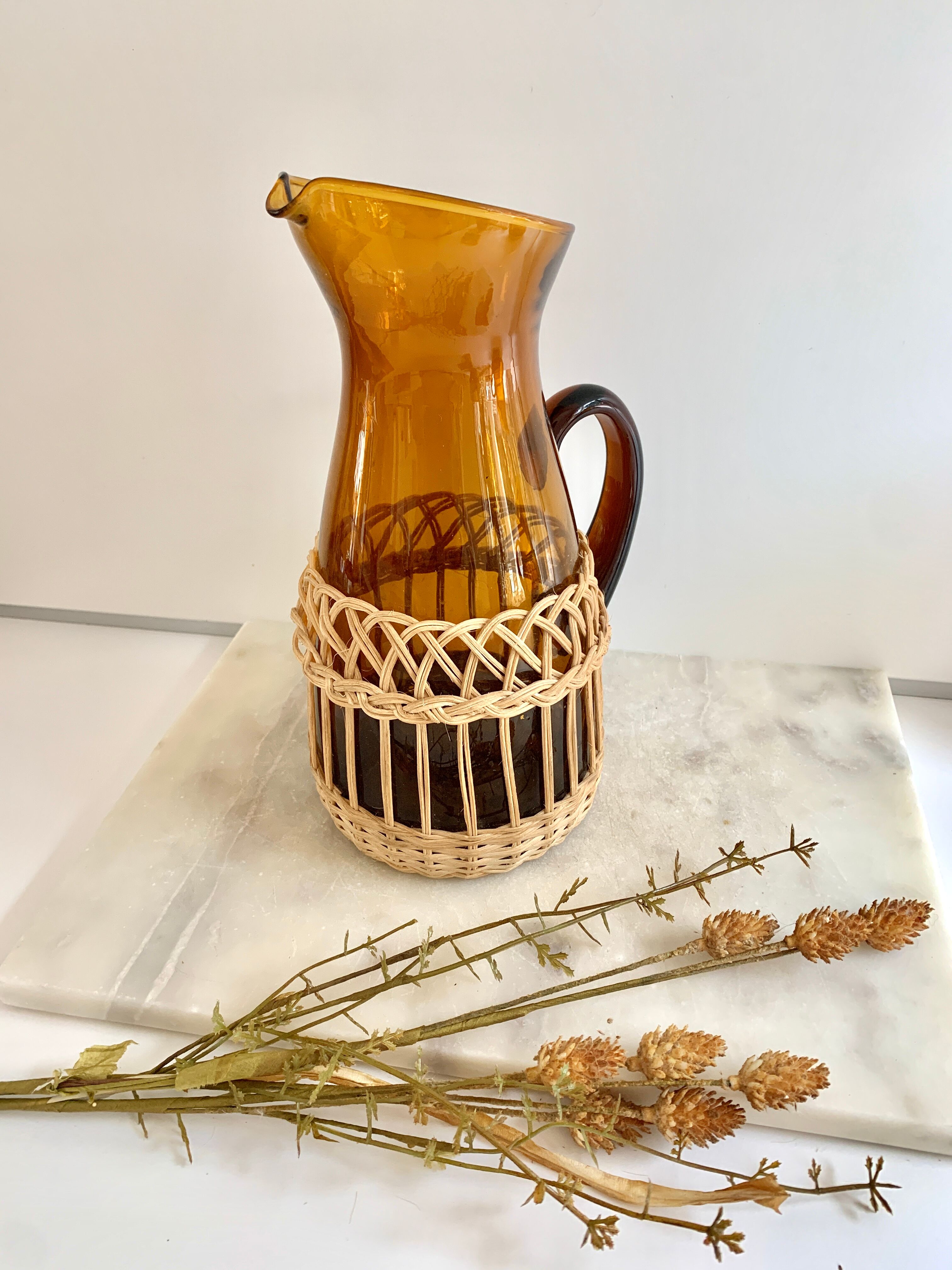 Amber glass and wicker carafe