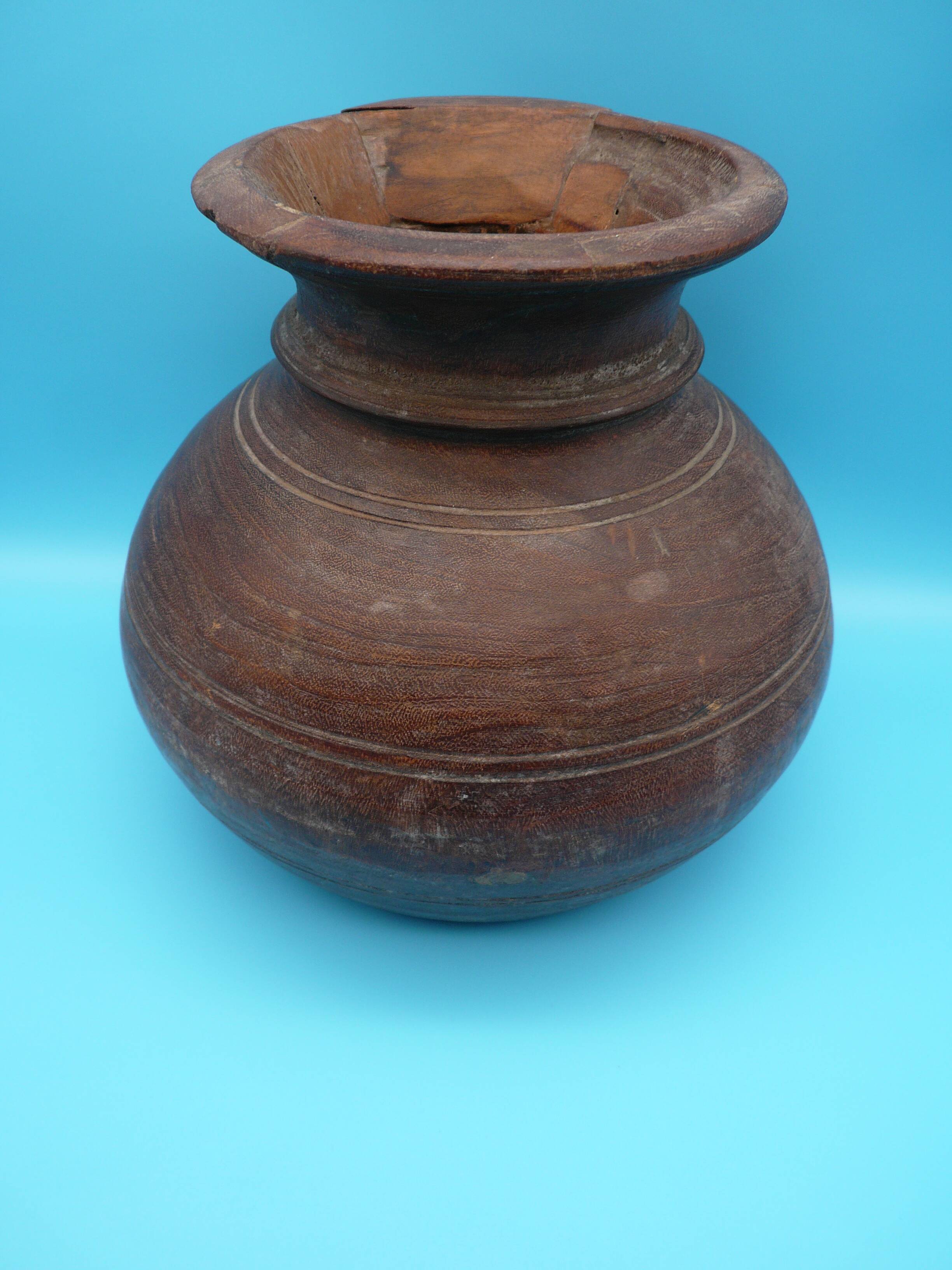 Large carved wooden pot / India