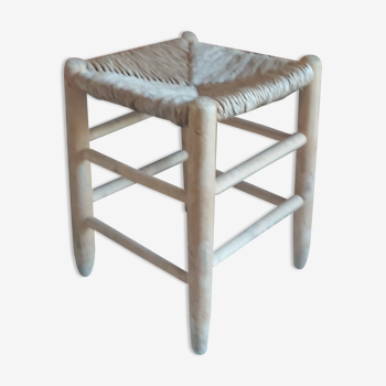 Wooden and vintage straw stool