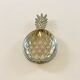 Empty pineapple pocket in silver metal