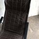 Mid-Century Japanese rocking chair in black leather, metal, and wood by Takeshi Nii (1950s)
