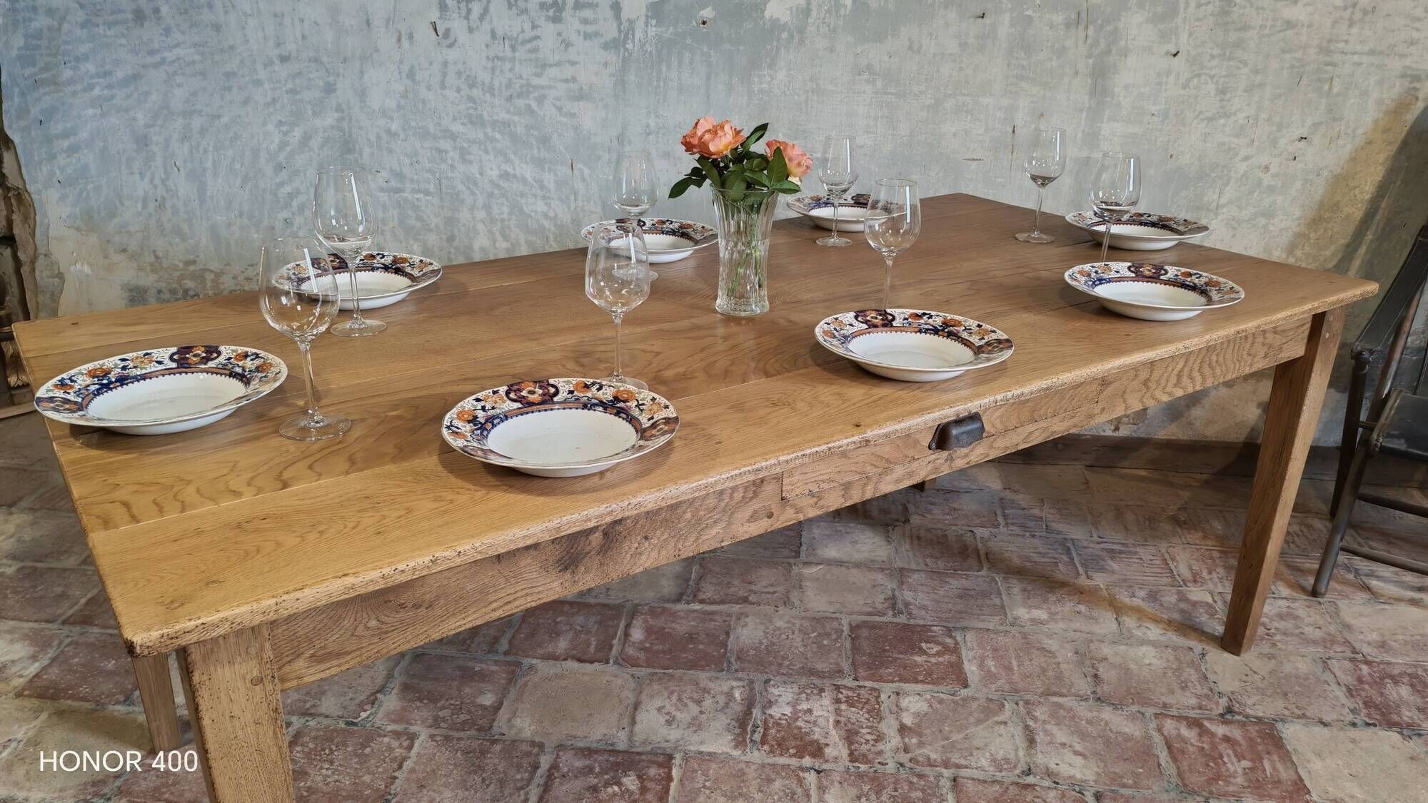 Large authentic farmhouse table made of solid French oak.