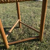 Vintage 1950s brutalist straw triangular stool