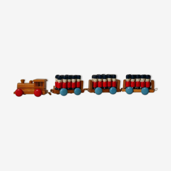 Wooden train with soldiers