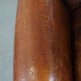 Cognac-colored vintage sheep leather wingback chair with character