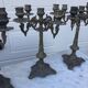 4 identical old brass candlesticks