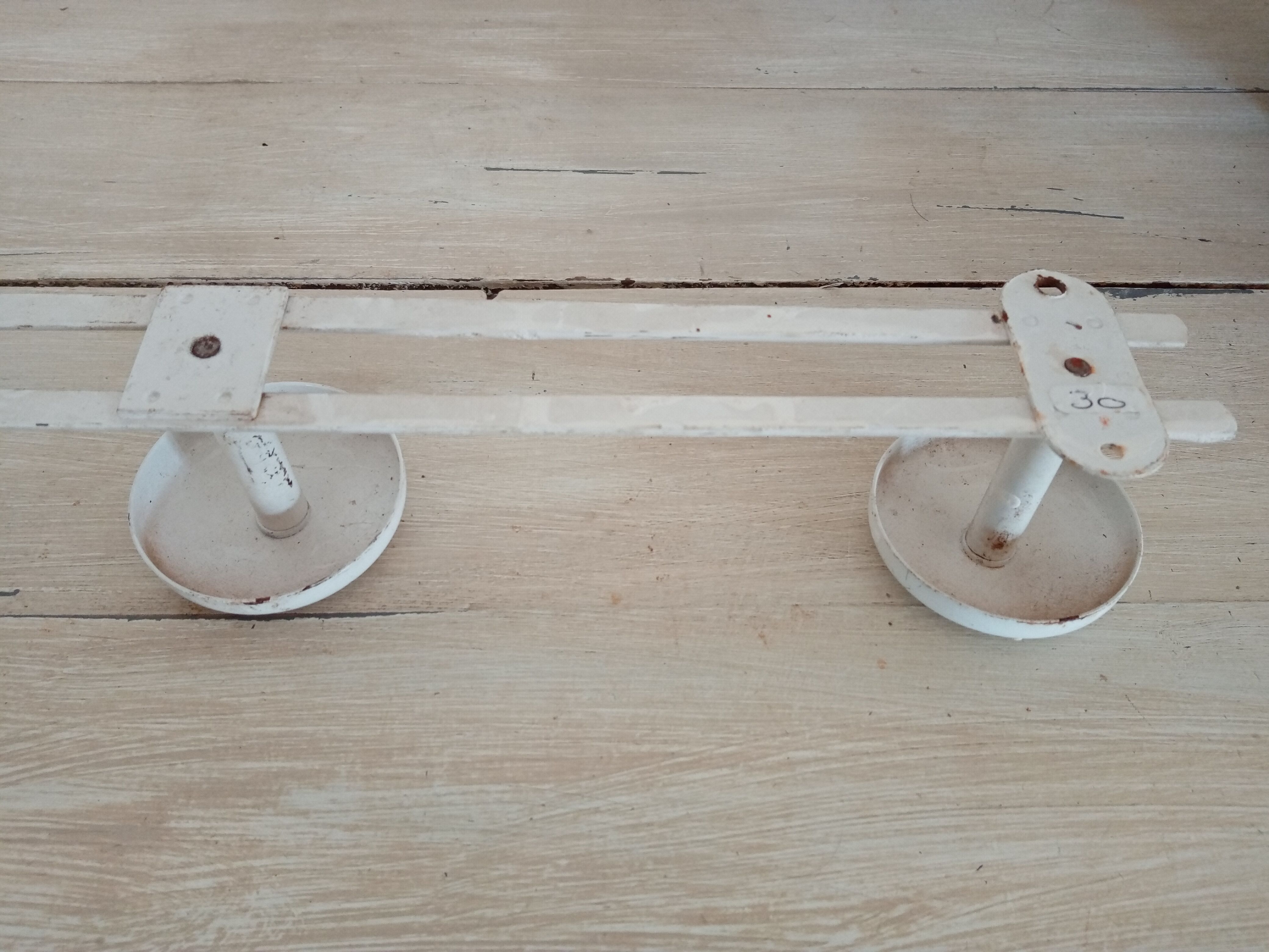 Metal wall coat holder
