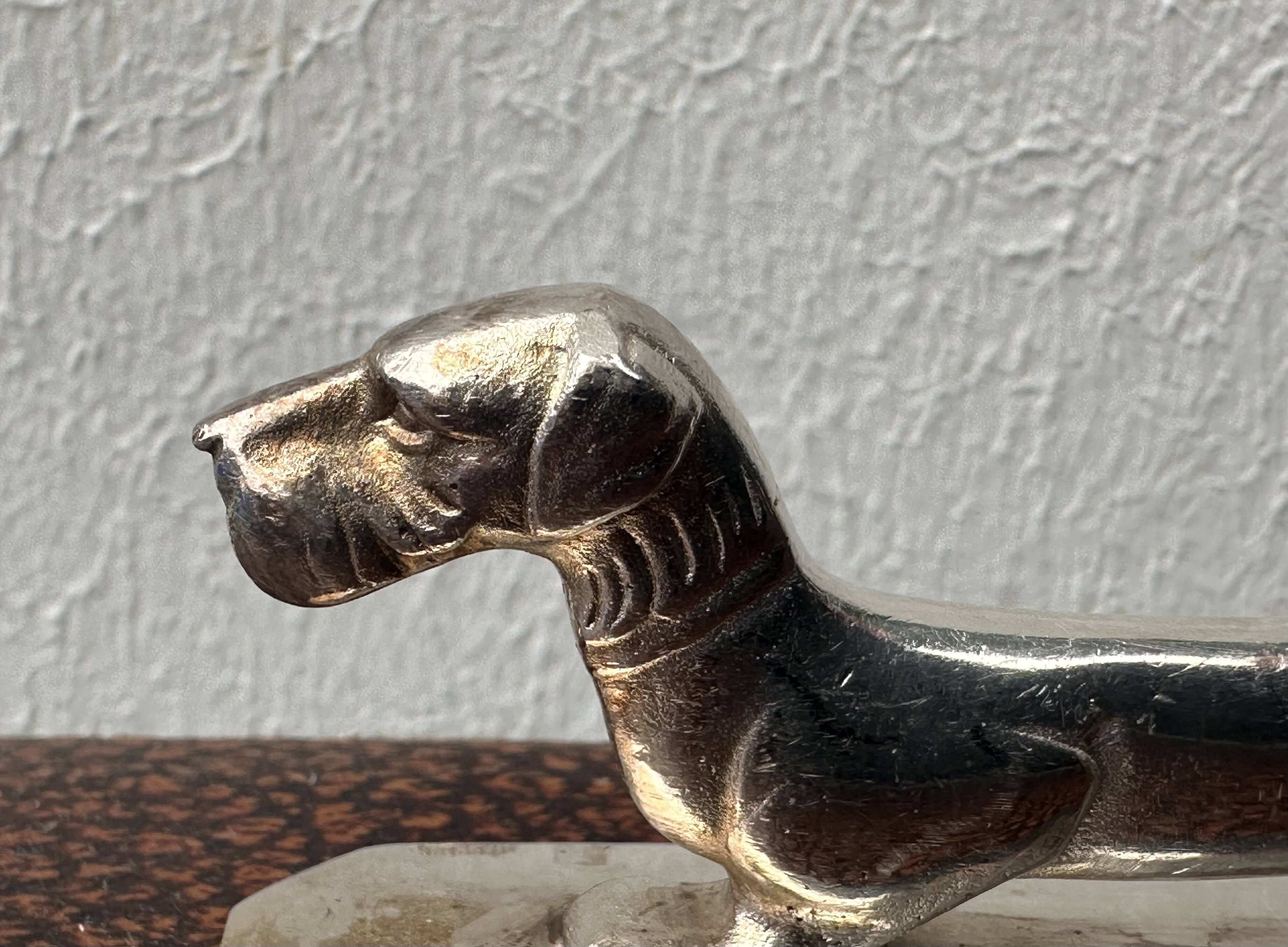 12 antique silver-plated bronze knife rests in modern art deco animal designs.