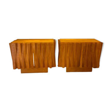 The pair of brutalist credenzas by Gaetan Pullanghiel.