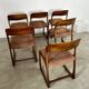 Set of 6 old baumann design sled chairs from the 60s wood and fabric
