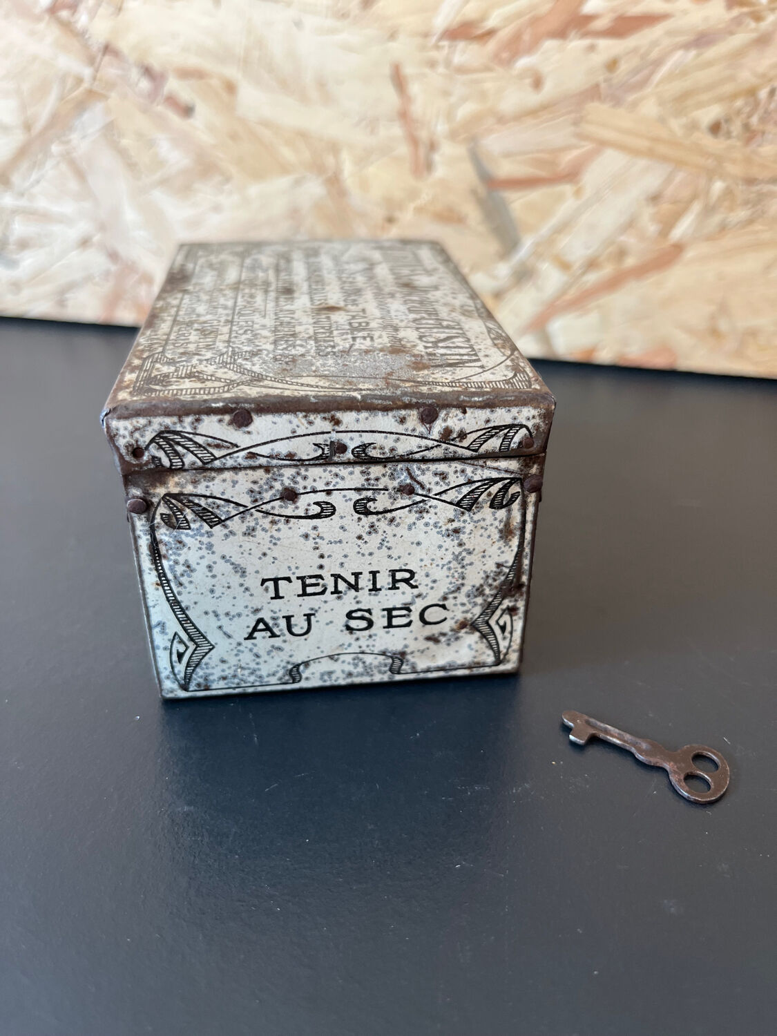 Old metal and wood medicine box with key