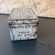 Old metal and wood medicine box with key