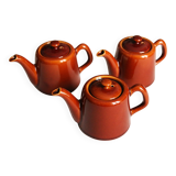3 brown glazed ceramic teapots