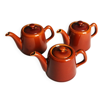 3 brown glazed ceramic teapots