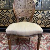 Suite of 6 Louis XVI style chairs in cane and fabric