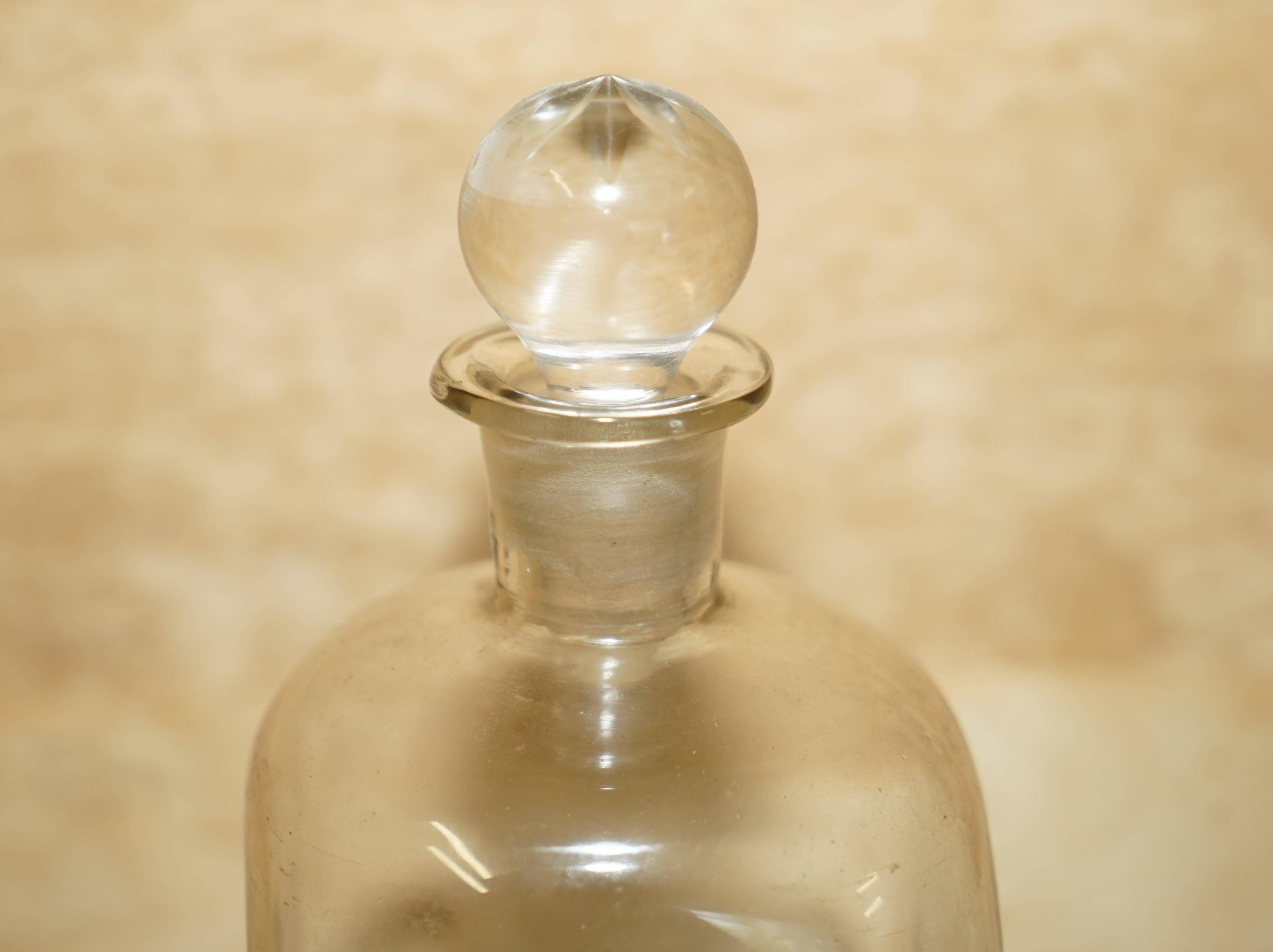 Pair of antique pinched decanters circa 1900 for serving whisky, bourbon, vodka, gin.