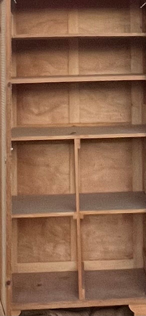 Renovated antique wardrobe in raw wood and caning.