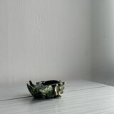 Green shell-shaped ashtray.