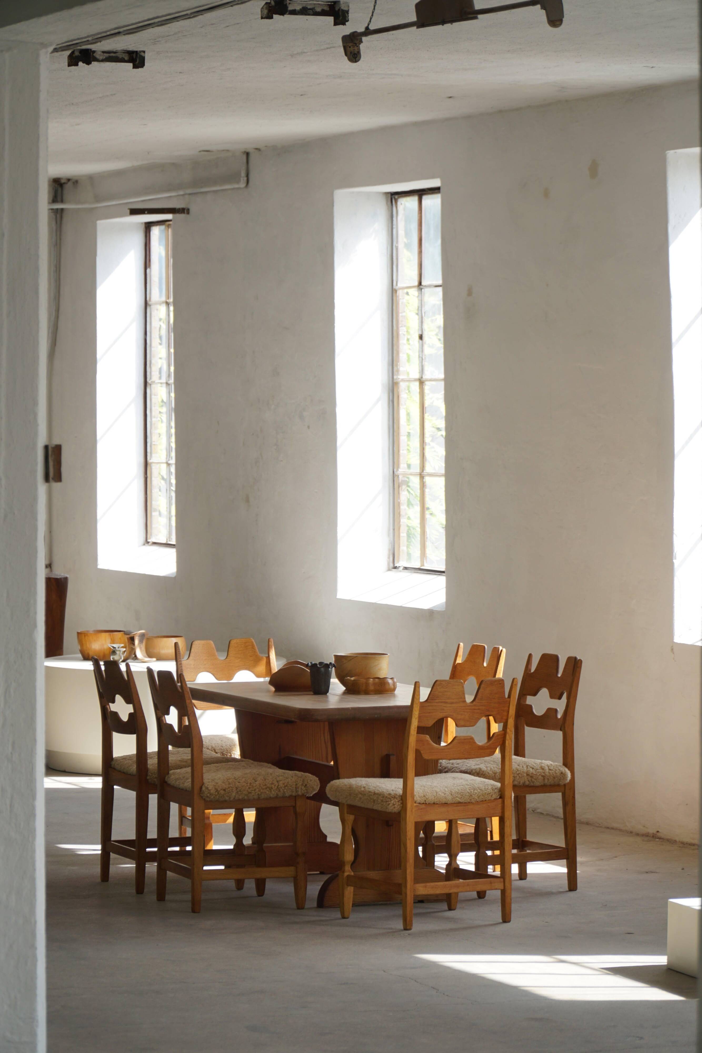 "Razorblade" dining chair by Henning Kjærnulf, in oak and lamb's wool, Denmark, 1960s.
