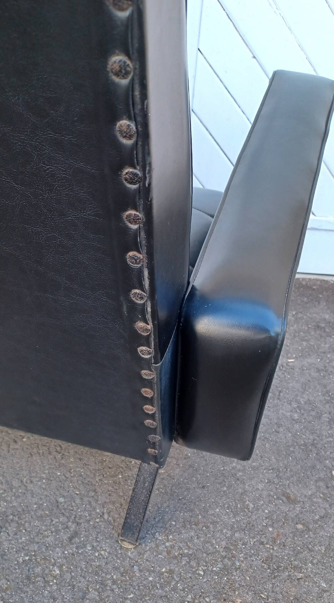Black faux leather armchair from the 1960s