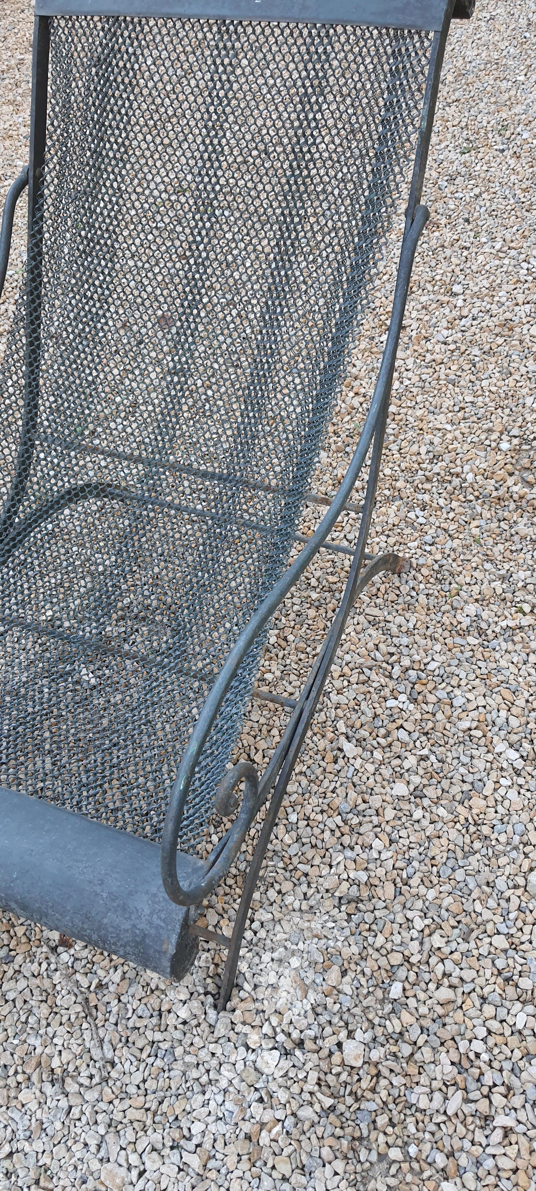 Relaxed wrought iron chair