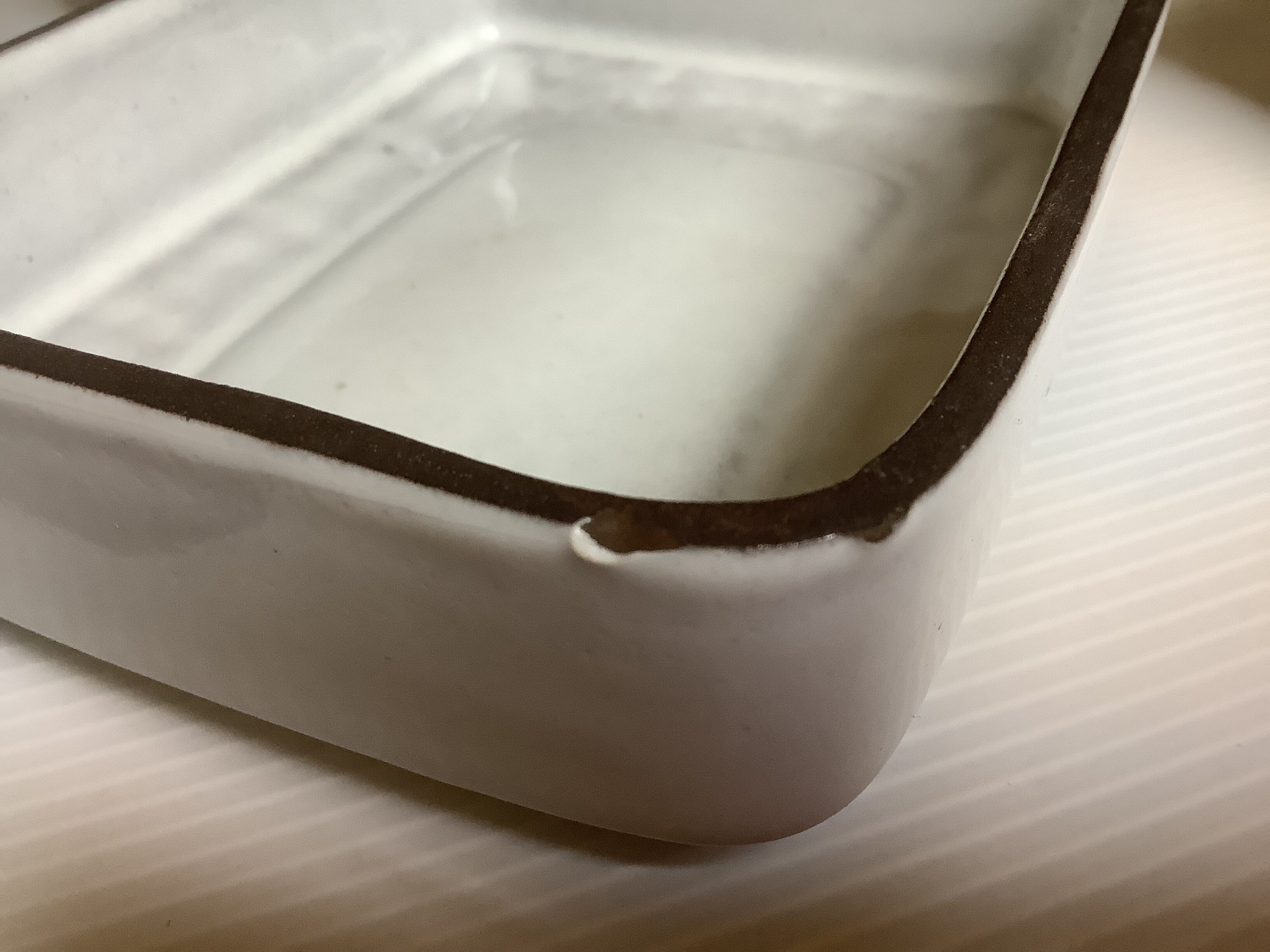 Butter dish with brown and beige ceramic lid