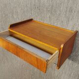 Scandinavian bedside wall shelf in teak