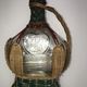 CASTAGNON glass carafe covered with wicker with music box