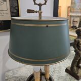 Three-armed brass hot water bottle lamp with empire green shade