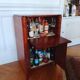 Antique bar cabinet on wheels