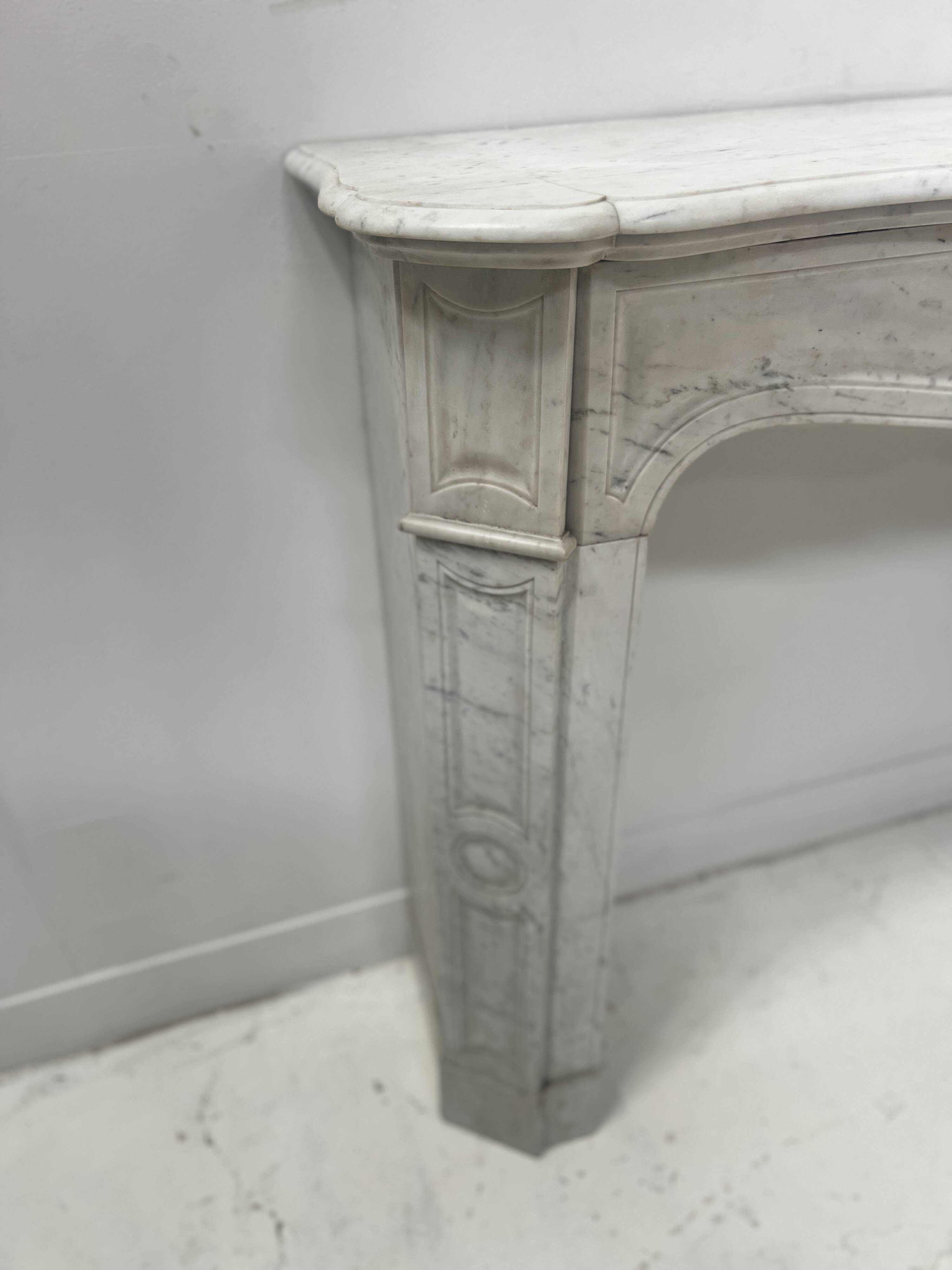 Louis XV style fireplace Model Pompadour White Carrara marble 20th century