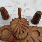 Vintage tablepiece in carved solid wood featuring salt, pepper and mustard pot