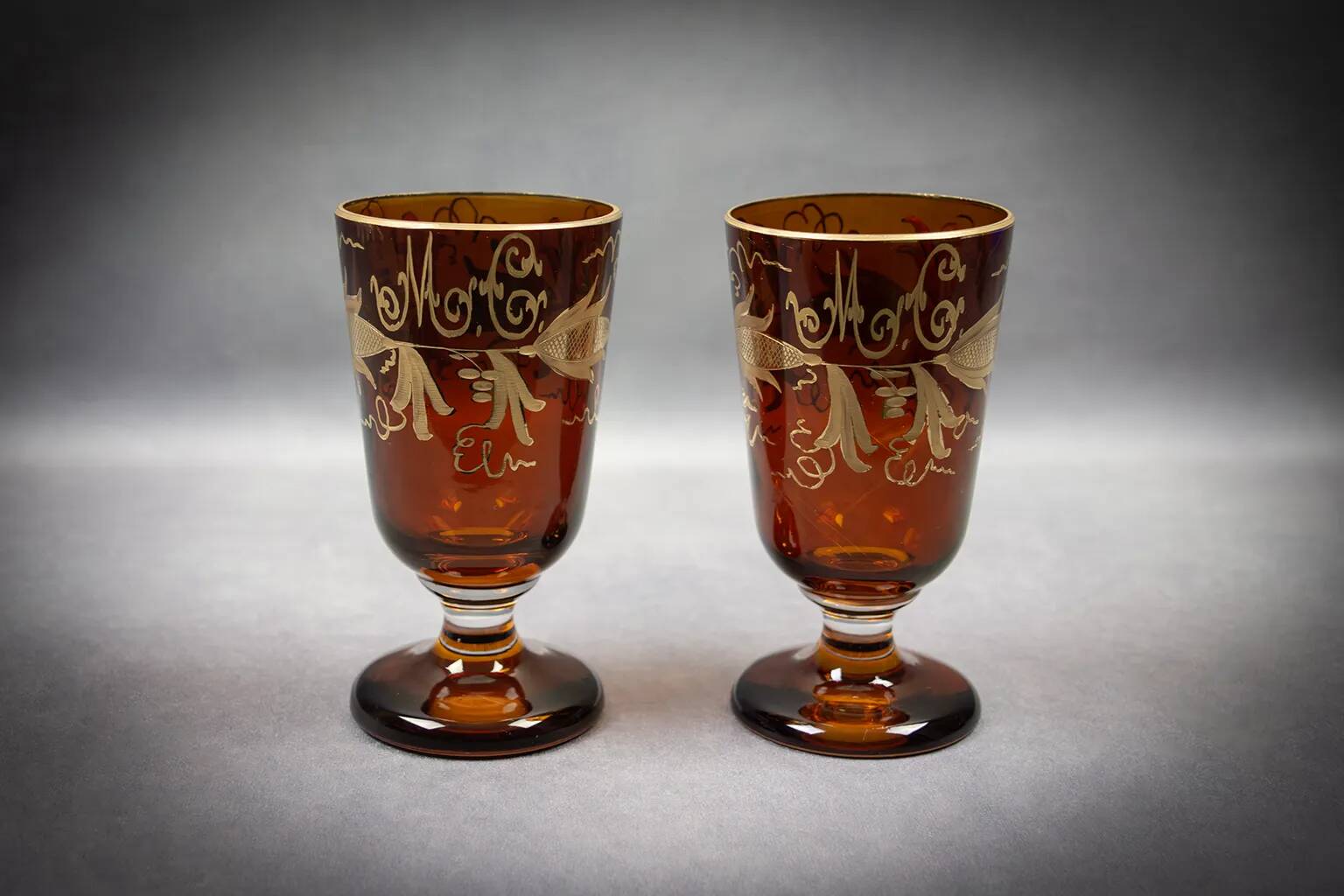 Pair of orange Bohemian glasses with monogram