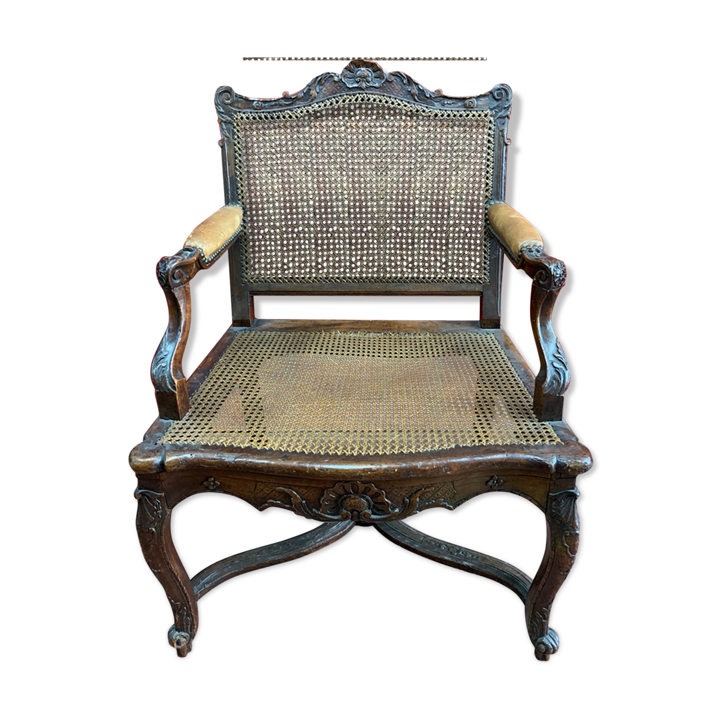 Fauteuil en noyer à fond de canne d'époque Régence début XVIIIème siècle
