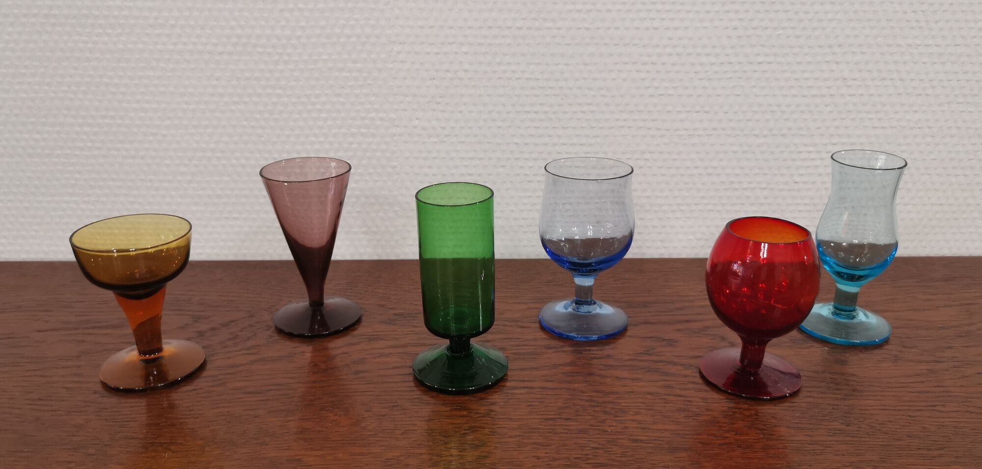 Set of 6 old liquor glasses on mismatched feet