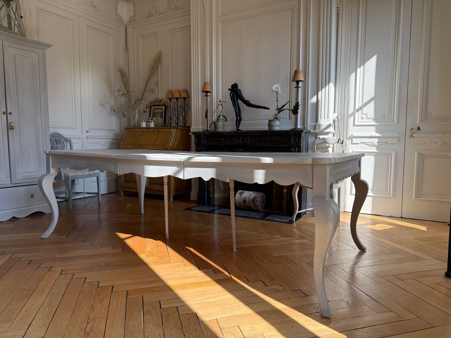 Large solid wood table made by a cabinetmaker.
