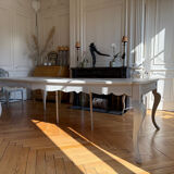 Large solid wood table made by a cabinetmaker.