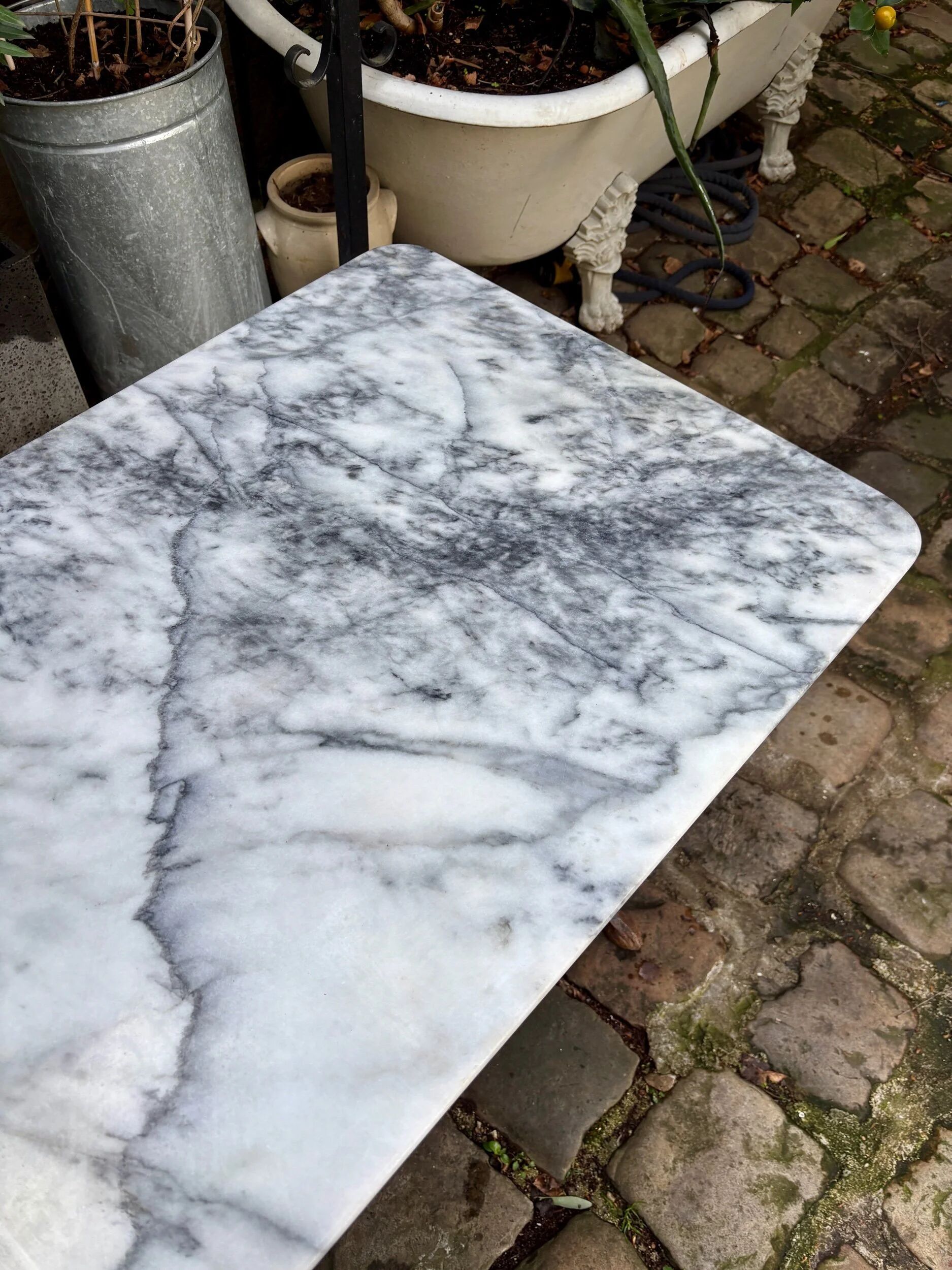 Grey marble bistro table with black cast iron ☐ 110 x 60 cm
